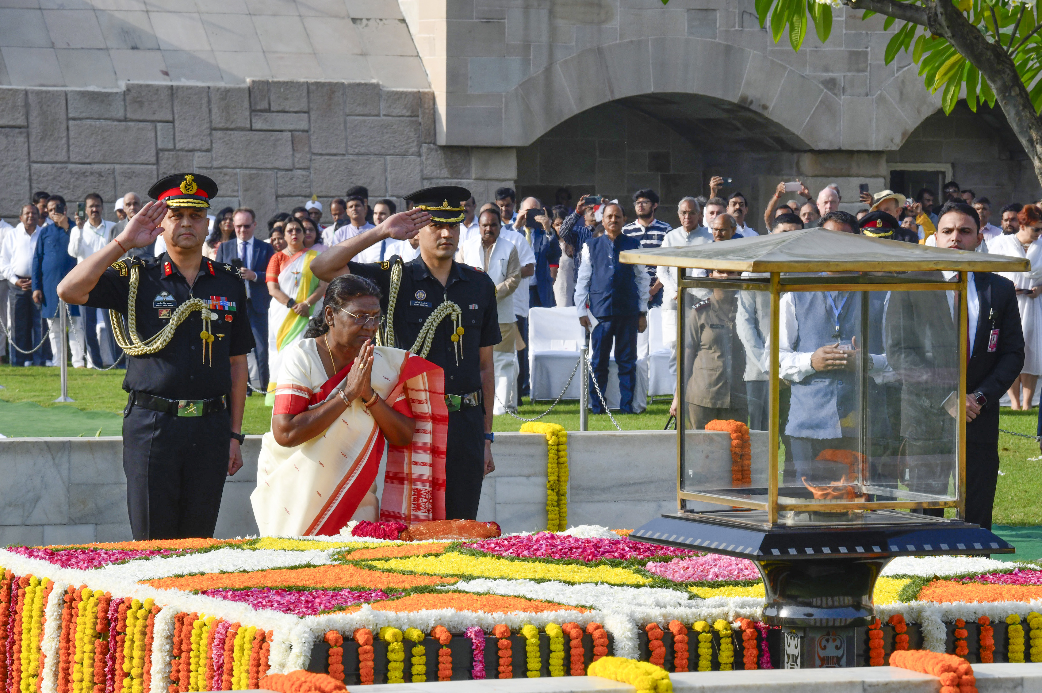 President Draupadi Murmu pays tribute to Mahatma Gandhi on the occasion of Gandhi Jayanti, at Rajghat in New Delhi on Monday.-ANI